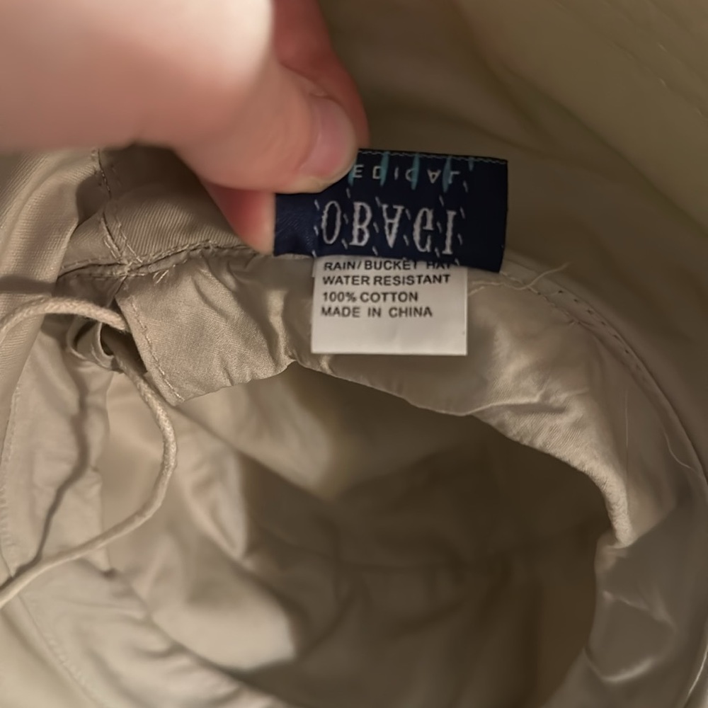 Cream colored rain bucket hat Obagi medical - Picture 8 of 8